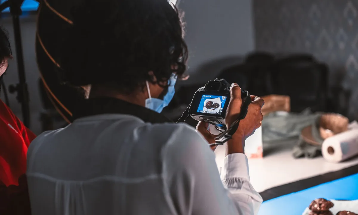 Photographer shooting a product for listing images